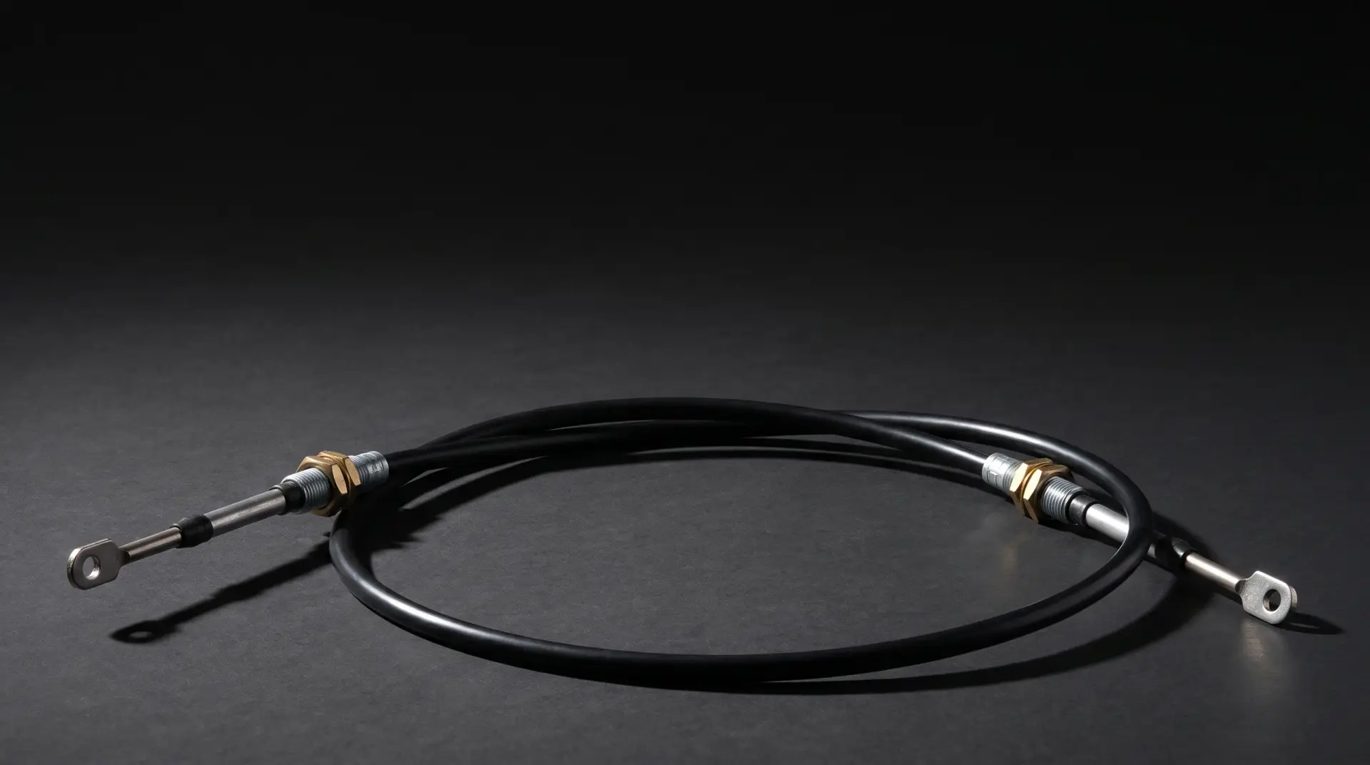 Ilustración de un cable push-pull industrial con fijación roscada, tuerca de bronce y varilla sólida con ojillo.